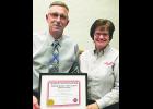 	On behalf of the Nebraska State Volunteer Firefighters Association, President Marlene Bomar presented Parrish Abel with a 25-year pin and certificate Abel’s 25 years of service to the Gering Fire Department.