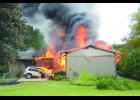 		The Grinnell Fire Department responded to a residential fire on July 31. The house and two vehicles were a total loss. Firefighters were able to rescue a cat and reunite it with its owner. The Gilman and Kellogg Fire Departments assisted at the scene while Midwest Ambulance provided rehab for firefighters. Firefighters were on the scene for three hours and the fire remains under investigation. Photo by Duane McClun of the Grinnell Fire Department.	